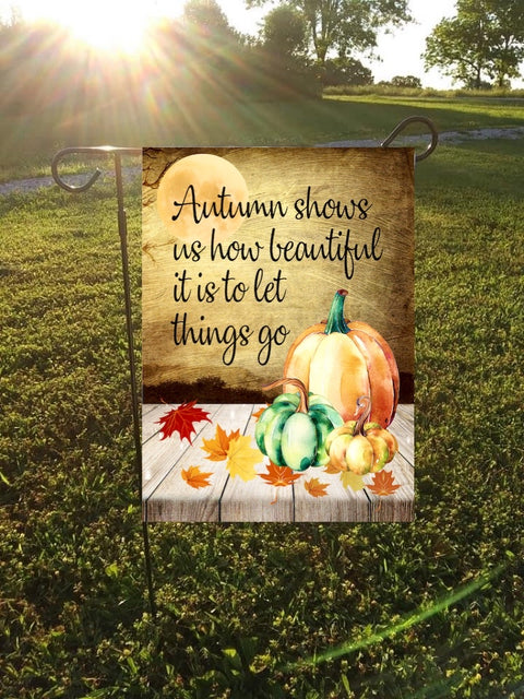 Autumn shows us how beautiful it is to let things go... fall garden flag