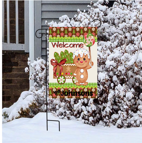 Gingerbread kid with candy and lollipop garden flag