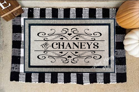 Hearts and scrollwork Family name personalized door mat