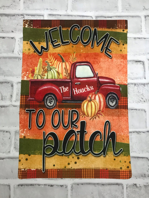 Patchwork fall red truck garden flag