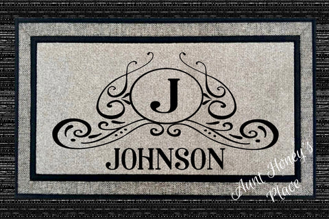 Scroll and center initial with family name doormat