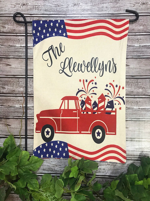 Patriotic firework fun and old red truck garden flag